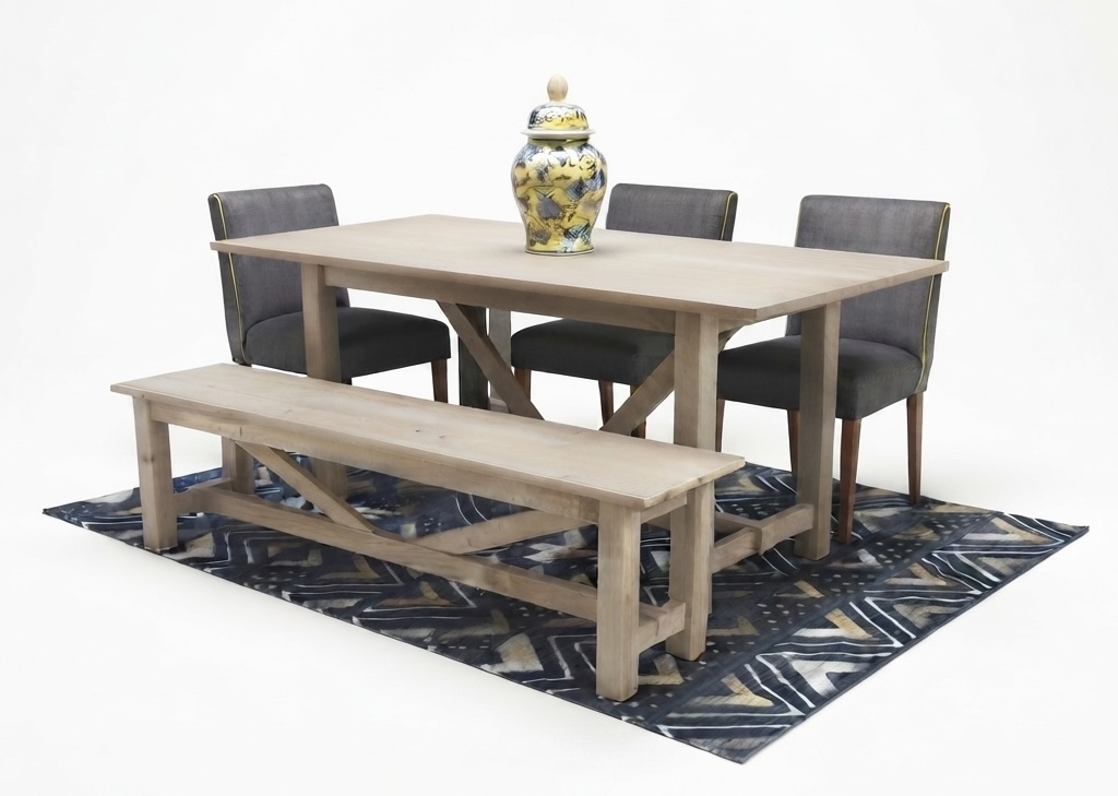 Solid wood dining table set with bench, upholstered chairs and ceramic vase